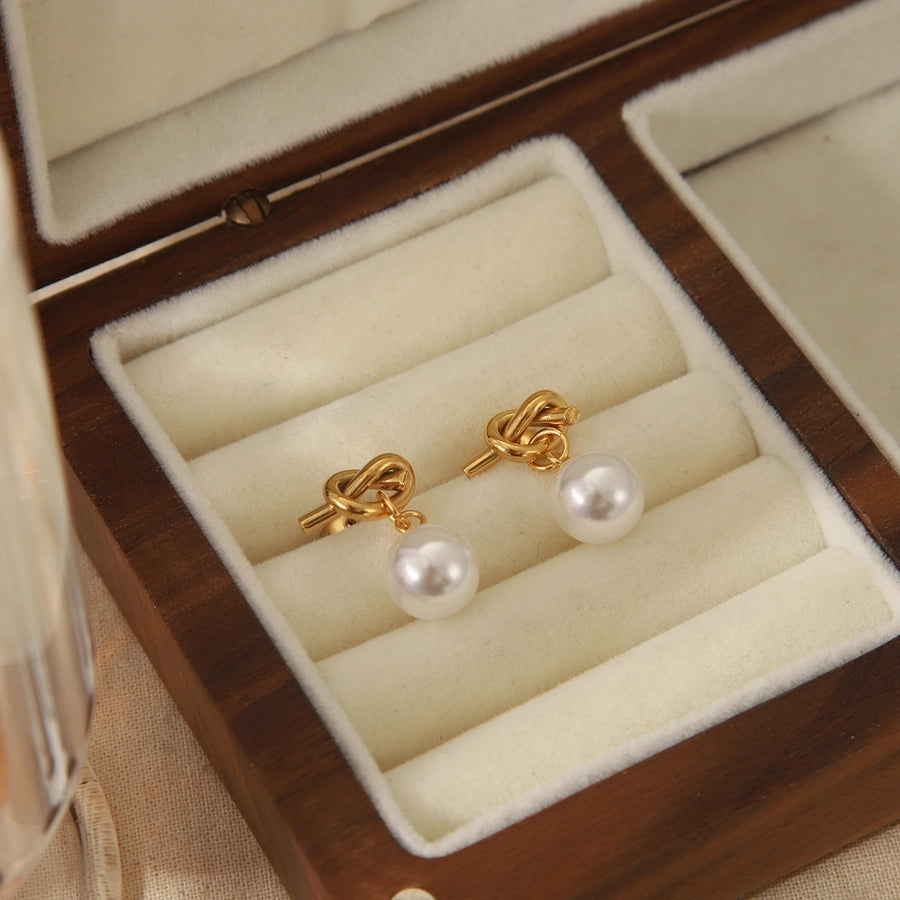 Parisian Knot Studs – 18K Gold-Plated Stainless Steel with Imitation Pearl Glam-Bijou Crush