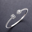 Trendy Square Zircon Bangle – Water Droplet Charm in Gold-Plated Copper-Bijou Crush