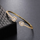 Trendy Square Zircon Bangle – Water Droplet Charm in Gold-Plated Copper-Bijou Crush